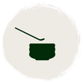 A dark green bowl icon with a matching spoon above it, centered inside a large textured off-white circular badge on a black background.
